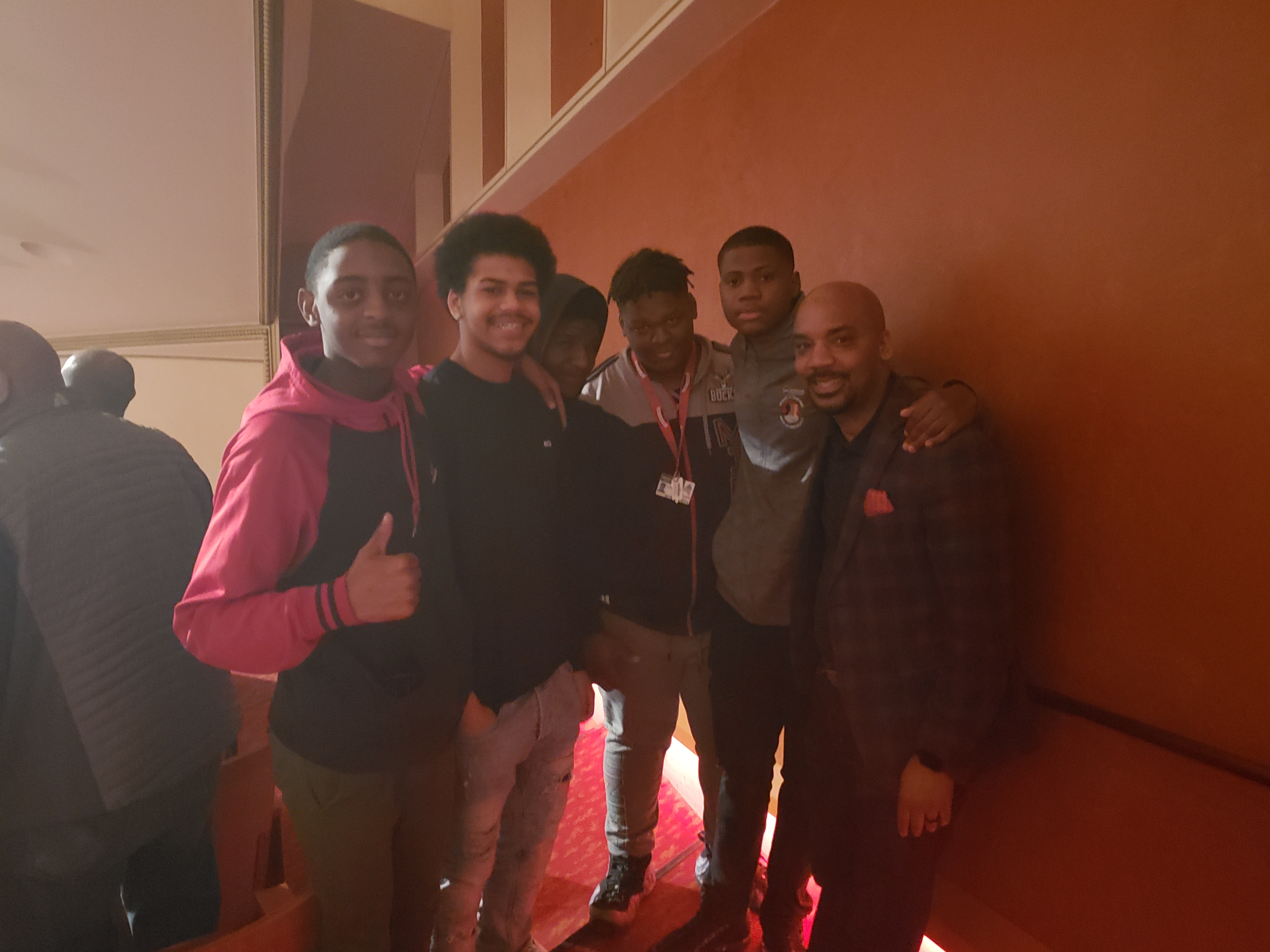 Image of youths posing at the Black Violin Concert